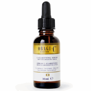 A 30 mL amber glass dropper bottle of Obagi-C System C-Clarifying Serum, labeled as a skin brightening serum. The label features gold and white colors with black text, highlighting that the product is non-comedogenic, non-acnegenic, allergy-tested, and hypoallergenic.